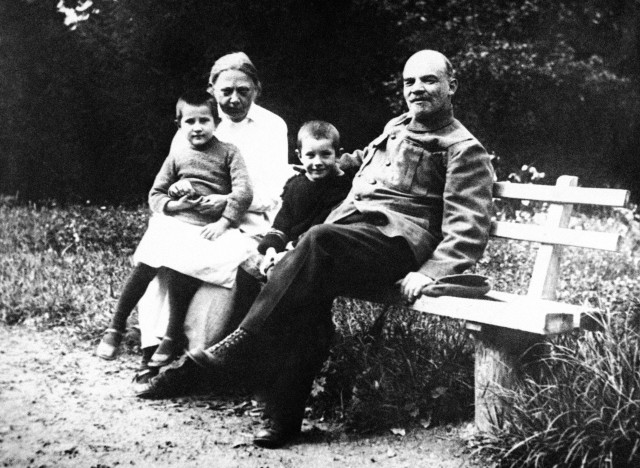 In Gorky in August-September 1922 with Nadezhda Krupskaya who holds Vera, daughter of the gardener, and Lenins nephew Viktor sits between them shown Feb. 15, 1922. (AP Photo)